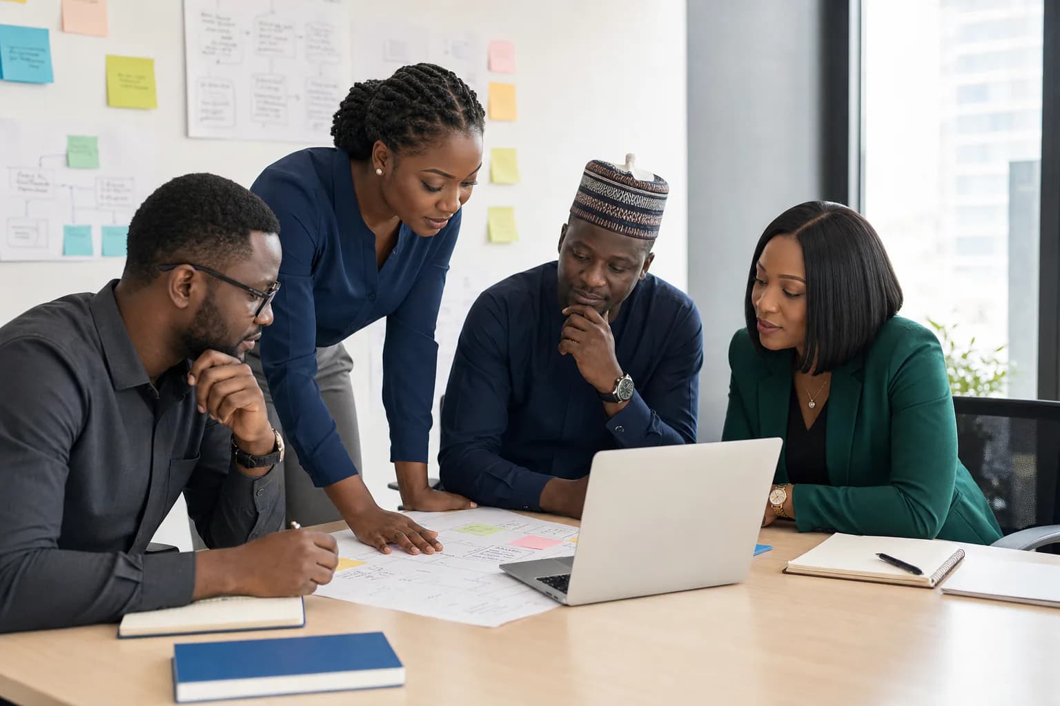 Nigerian business team mapping CRM lead sources and follow-up workflows